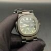 Patek Philippe — esfera negra con fases lunares, caja y brazalete negros
