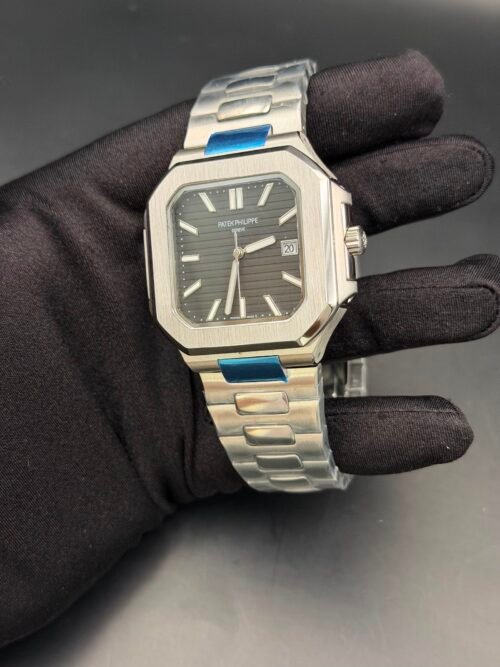 Patek Philippe — caja octagonal, esfera gris oscura y brazalete de acero