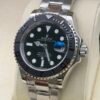 Rolex — esfera negra, bisel negro y brazalete de acero