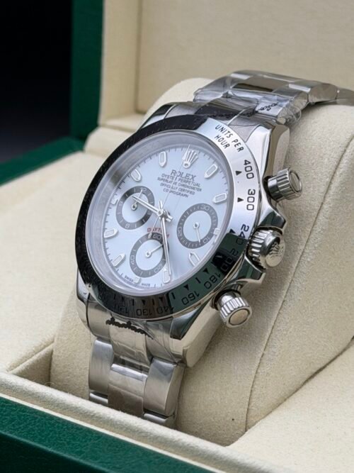 Rolex — cronógrafo con esfera azul hielo, bisel negro y brazalete de acero