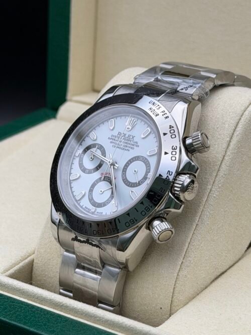 Rolex — cronógrafo con esfera azul hielo, bisel negro y brazalete de acero