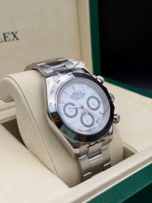 Rolex — cronógrafo con esfera azul hielo, bisel negro y brazalete de acero