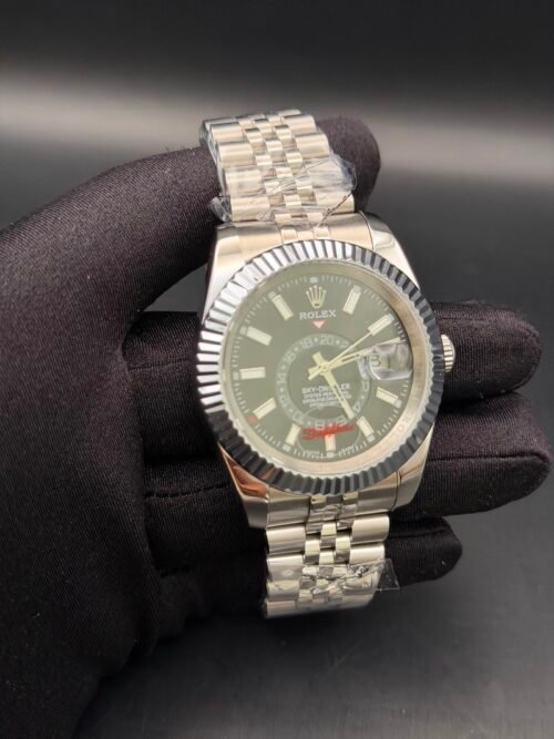 Rolex — esfera verde oliva con calendario anual, bisel estriado y brazalete jubilee de acero