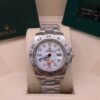 Rolex — esfera blanca con aguja GMT naranja y brazalete de acero