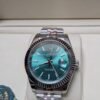 Rolex — esfera verde menta, bisel estriado y brazalete jubilee de acero