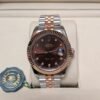 Rolex — esfera chocolate con brillantes, bisel oro rosa estriado y brazalete jubilee bicolor