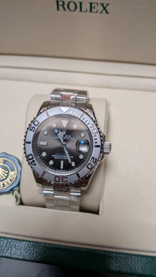 Rolex — esfera gris oscura, bisel de acero y brazalete de acero