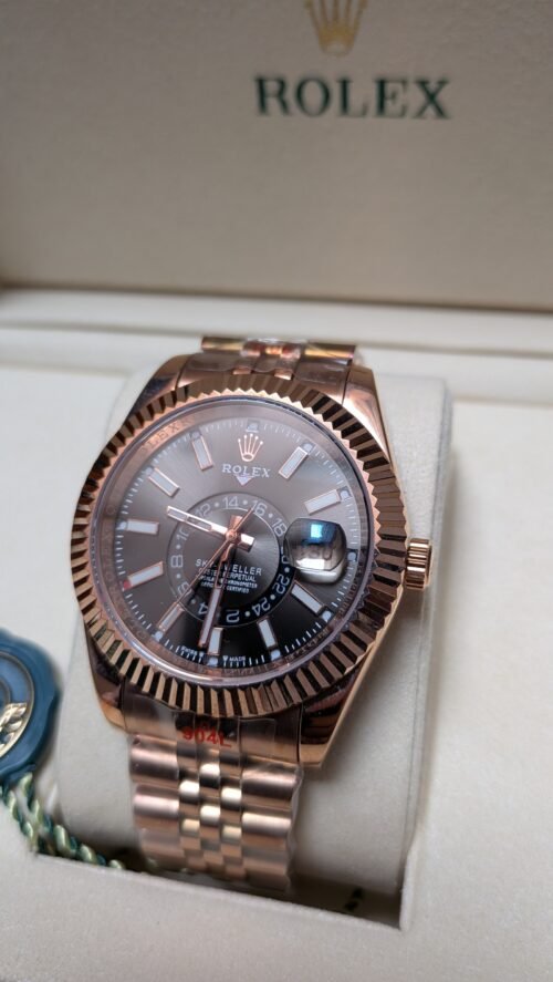Rolex — esfera negra con calendario anual, caja oro rosa y brazalete jubilee oro rosa