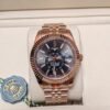 Rolex — esfera negra con calendario anual, caja oro rosa y brazalete jubilee oro rosa