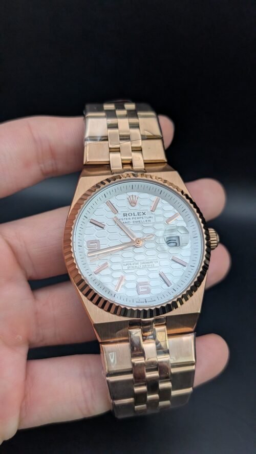 Rolex — esfera blanca con patrón de panal, caja y brazalete jubilee oro rosa