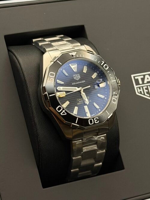 TAG Heuer — esfera azul texturizada, bisel azul y brazalete de acero