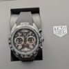 TAG Heuer — cronógrafo esqueleto, caja gris y correa de caucho negra