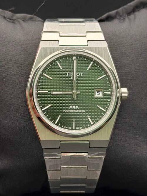 Tissot — esfera verde texturizada y brazalete de acero