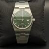 Tissot — esfera verde texturizada y brazalete de acero
