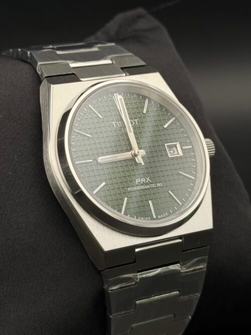 Tissot — esfera verde texturizada y brazalete de acero