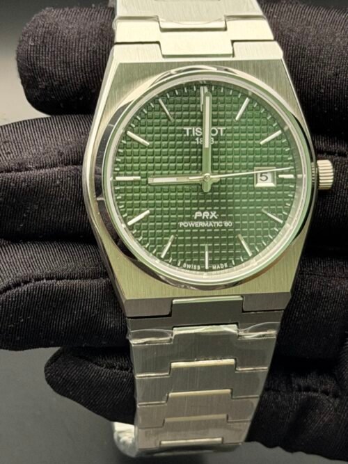 Tissot — esfera verde texturizada y brazalete de acero