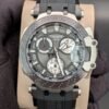 Tissot — cronógrafo con esfera gris y subesferas blancas, caja gris y correa negra