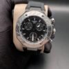 Tissot — cronógrafo con esfera negra, caja de acero y correa de caucho negra