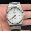Tissot — esfera blanca y brazalete de acero