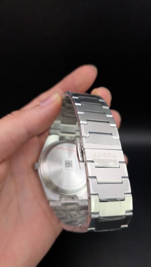 Tissot — esfera blanca y brazalete de acero