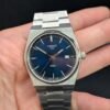 Tissot — esfera azul y brazalete de acero