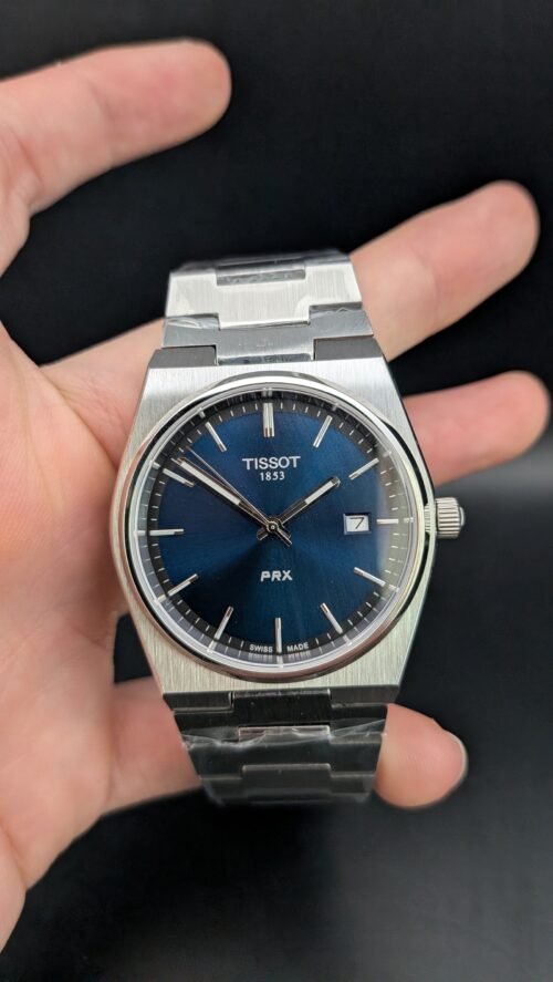 Tissot — esfera azul y brazalete de acero