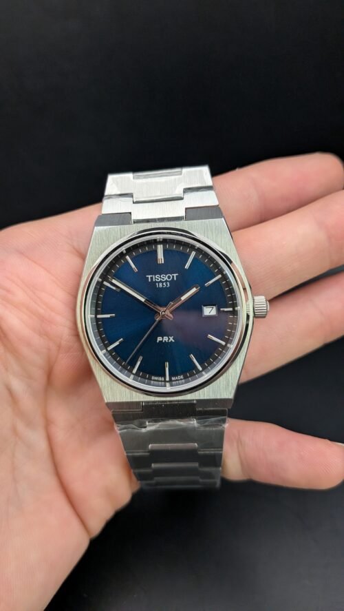 Tissot — esfera azul y brazalete de acero