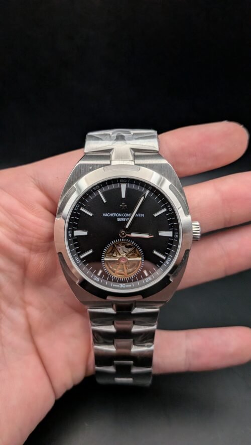 Vacheron Constantin — esfera negra con tourbillon a la vista y brazalete de acero