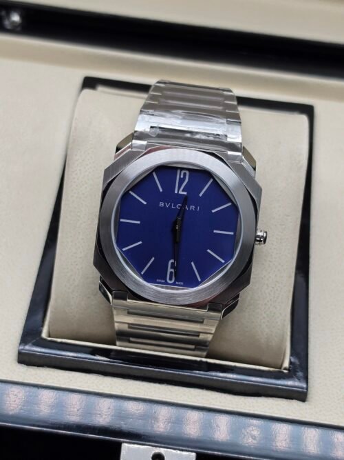 Bvlgari — esfera azul y brazalete de acero