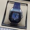 Cartier — caja cuadrada de acero, esfera azul y correa de caucho azul
