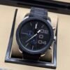 Diesel — cronógrafo todo negro con detalles azules y correa negra