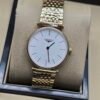 Longines — esfera blanca, caja oro rosa y brazalete dorado