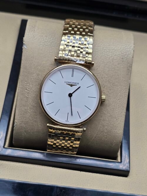 Longines — esfera blanca, caja oro rosa y brazalete dorado