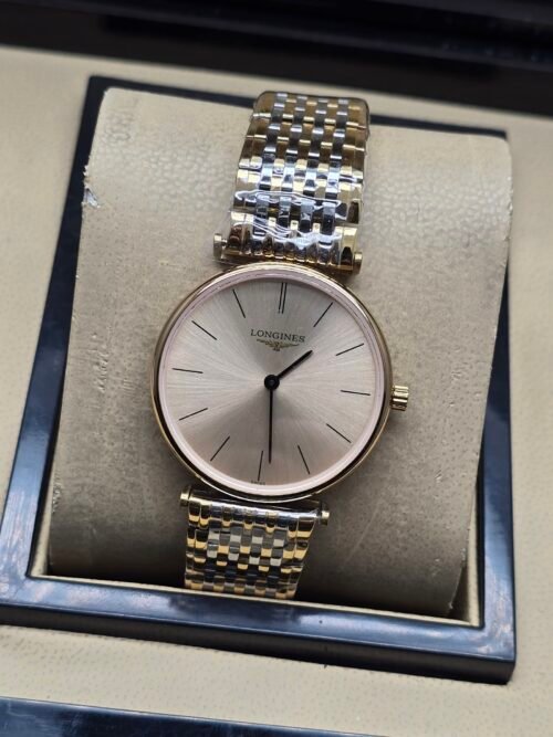Longines — esfera champaña, caja oro rosa y brazalete dorado