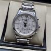 Longines — cronógrafo con esfera blanca y brazalete de acero