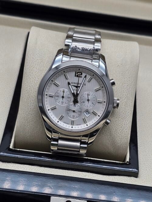 Longines — cronógrafo con esfera blanca y brazalete de acero