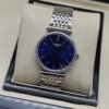 Longines — esfera azul y brazalete de acero