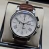 Montblanc — cronógrafo con esfera blanca y números romanos, correa de cuero marrón