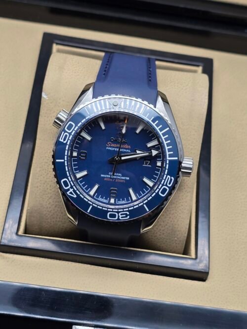Omega — esfera azul, bisel azul y correa de caucho azul
