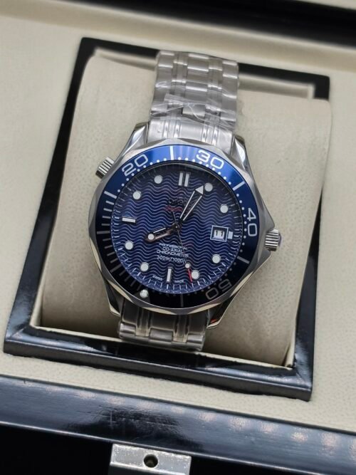 Omega — esfera azul ondulada, bisel azul y brazalete de acero