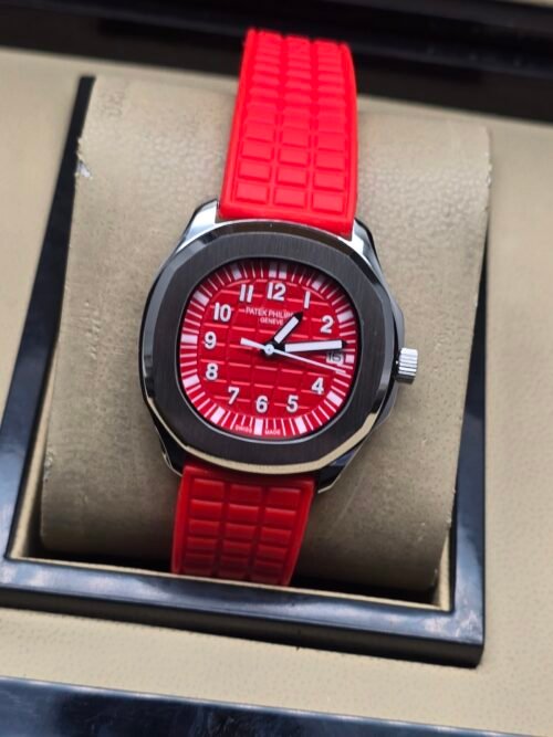 Patek Philippe — esfera roja, caja de acero y correa de caucho roja