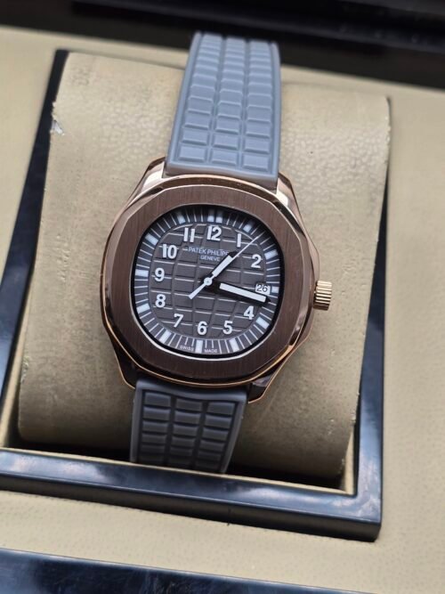 Patek Philippe — esfera gris, caja oro rosa y correa de caucho gris