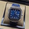 Patek Philippe — caja octagonal, esfera azul y correa de caucho azul