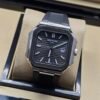 Patek Philippe — caja octagonal, esfera negra y correa de caucho negra