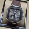 Patek Philippe — caja octagonal, esfera gris con fases lunares y correa de caucho marrón