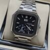Patek Philippe — caja octagonal, esfera negra con fases lunares y brazalete de acero