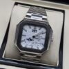 Patek Philippe — caja octagonal, esfera blanca con fases lunares y brazalete de acero