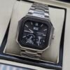 Patek Philippe — caja octagonal, esfera negra con fases lunares y brazalete de acero