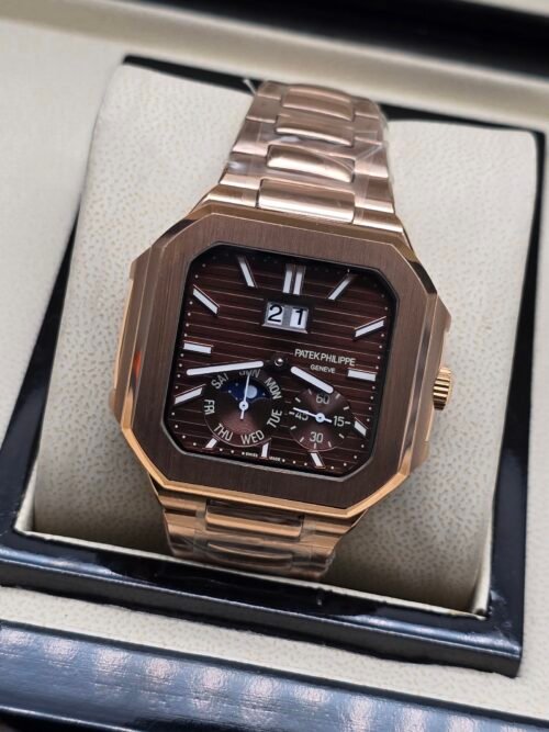 Patek Philippe — caja octagonal oro rosa, esfera marrón con fases lunares y brazalete oro rosa