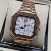 Patek Philippe — caja octagonal oro rosa, esfera blanca con fases lunares y brazalete oro rosa